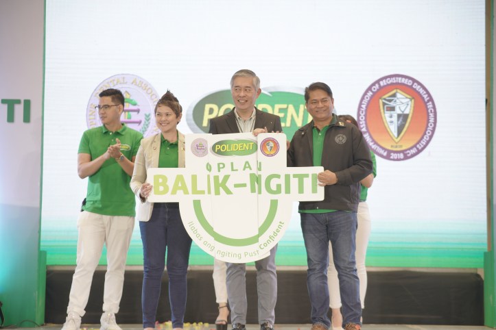 Symbolizing OPLAN Balik Ngiti Partnership between Dr. Cheryl del Rosario (PDA), Jeffrey Go (Haleon), and Dr. Ronaldo Nunez (PARDTI)