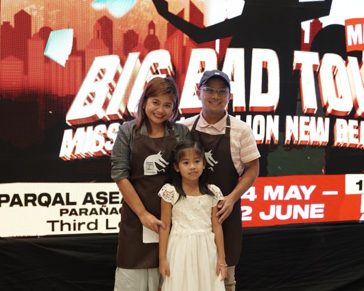 Monica (center) with her parents